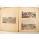 A circa late 19th Century photograph album containing approximately 18 albumen print and other