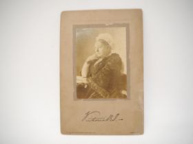 A large mounted photograph of Queen Victoria (1819-1901), the image depicting the Queen c.1860's,