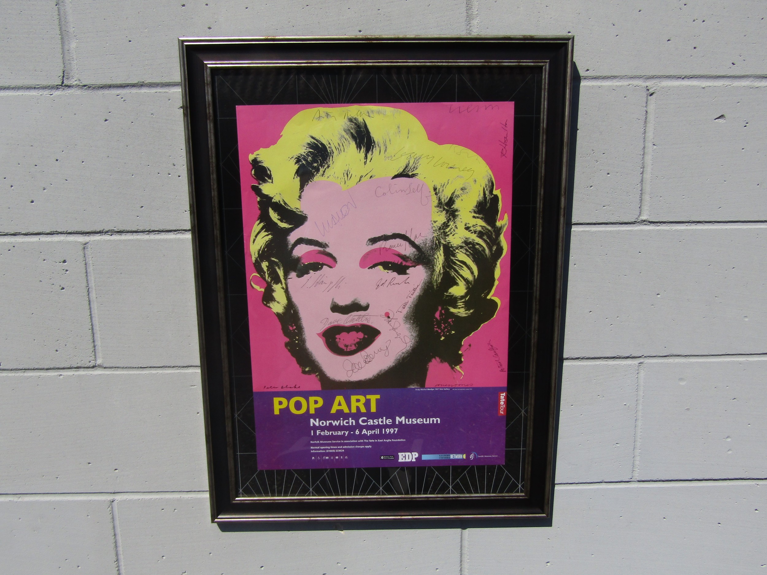 A Pop Art exhibition poster featuring Andy Warhol's Marilyn Monroe image. This was purchased