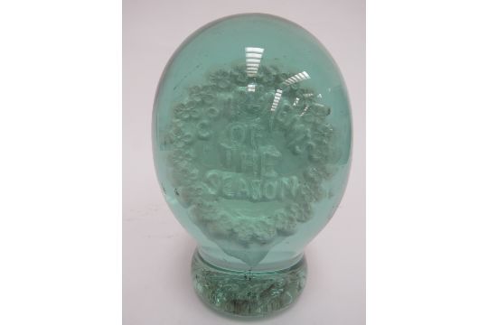 A large Victorian green glass dump with a plaster plaque inclusion "Compliments of the Season", 15cm - Image 2 of 4