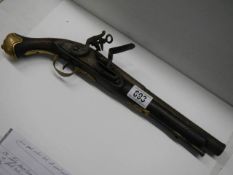 A Flintlock pistol by Brander and Potts, London.