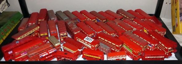 A good lot of red London die cast buses etc