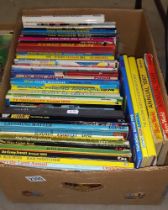 A good lot of annuals and books including Boys World, Judy, The Wombles, The Beezer etc