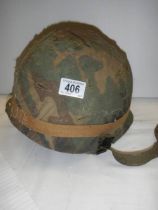A United States army Vietnam era helmet.