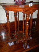 A mahogany eight leg side table. COLLECT ONLY