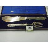 A cased pair of silver plate fish servers.