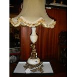 A circa 1950's heavy marble table lamp with gilded cherub figure. COLLECT ONLY.