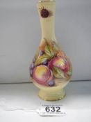 An Aynsley Orchard Gold bud vase signed D Jones.