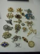 A collection of old paste set brooches including 2 marquasite examples etc., 20 in total.