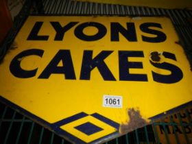 An old double sided Lyons cakes enamel advertising sign, COLLECT ONLY.