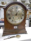 A late Victorian mahogany bracket clock, in working order.