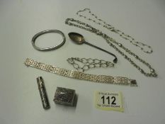 A mixed lot of necklaces, bracelets, silver spoon, pill box etc.