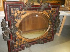 A large oval decorative framed mirror. COLLECT ONLY.