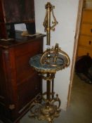 A mid Victorian heavy brass standard lamp base. COLLECT ONLY.