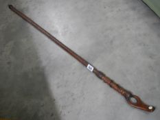 A Welsh style walking stick with carved top.