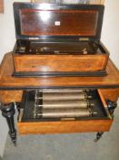 A good Victorian music box on stand playing 36 tunes on 6 barrels in good working order