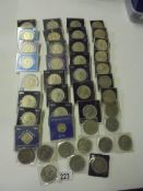 Approximately 45 commemorative coins including Royalty, Churchill etc.,