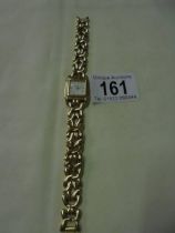 A ladies Accurist wrist watch.