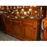 A 20th century mahogany three door, three drawer sideboard, COLLECT ONLY.