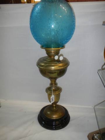 A good Victorian oil lamp with original blue acid etched shade. COLLECT ONLY.