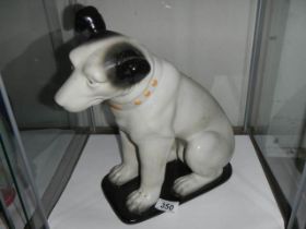 A HMV Nipper dog figure.