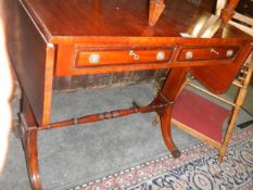 A good mahogany two drawer drop leaf hall table, COLLECT ONLY.