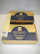 Two boxes of Sotheby's matches, 10 packs in each box and all complete and unused.
