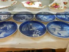 Seven Royal Copenhagen cabinet plates.