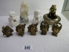 A quality Chinese lot comprising a set of 5 small happy Buddha bronze weights (signed) H 7cm;