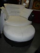 A large contemporary two seater revolving chair with matching foot stool, COLLECT ONLY.