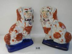 A pair of modern Victorian style Staffordshire spaniels