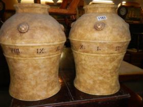 A pair of large ceramic vases featuring Roman numerals, COLLECT ONLY.