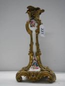 A 19th century French style ormolu mounted hand painted porcelain candlestick.