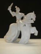 A ceramic figure of a Samaroi soldier on a horse.