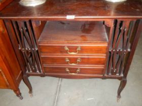 An Edwardian music cabinet. COLLECT ONLY.