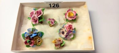 A collection of vintage hand made English china brooches, Coalbrookdale etc., and a pair of earrings