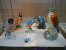 A quantity of bird figures including Beswick.