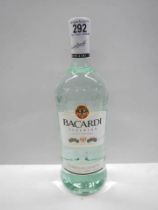 A bottle of Bacardi signed by J Barcardi.