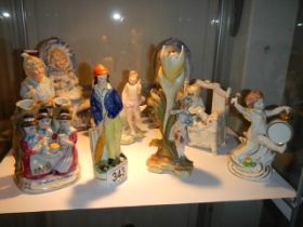 Nine good mid 20th century porcelain figures.