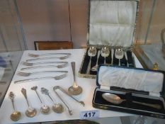 Nineteen pieces of silver flat ware.