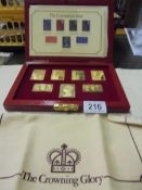 A limited edition coronation issue of gold plated solid silver stamp dies (4959 of 5000),