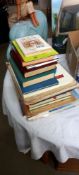 A mixed lot of books including Florence Upton etc.