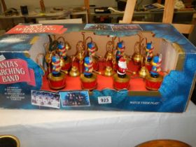 A boxed 'Santa's Marching Band' in working order.