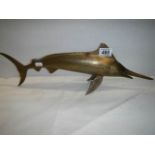 A bronze Marlin Ornament.