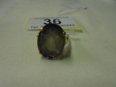 A 9ct gold ring set smoky stone, size L, 3.3 grams.