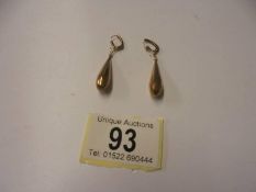 A pair of gold pendant earrings, 3.3 grams.