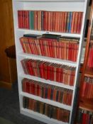 Five shelves of interesting books including bookcase . COLLECT ONLY.