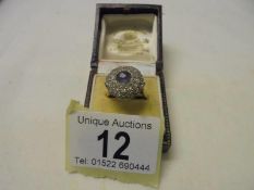 An 18ct yellow gold sapphire and diamond ring, size Q, 6.1 grams.