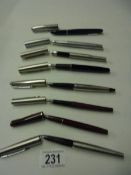 Eight assorted Parker fountain pens, all in good condition.