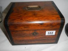 A Victorian mahogany ladies travelling box with three scent bottles.